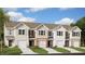 Charming townhome community showcasing craftsman-style architecture and professionally landscaped surroundings at 404 Ember St, Sanford, NC 27330