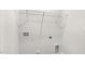 Practical laundry room with convenient hookups and wire shelving, offering efficient space for laundry needs at 404 Ember St, Sanford, NC 27330