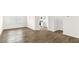Open-concept living area with durable flooring and seamless flow to the kitchen and other spaces at 404 Ember St, Sanford, NC 27330