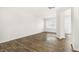 Bright and airy living room with neutral decor, durable flooring, and ample natural light at 404 Ember St, Sanford, NC 27330