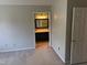 Spacious bedroom showcasing an ensuite bathroom with double sink vanity at 409 Vista Springs Cir, Holly Springs, NC 27540