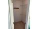 Walk-in closet showing ample storage space with shelving and hanging options at 409 Vista Springs Cir, Holly Springs, NC 27540