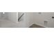 Hallway with white walls, carpet, and wood floors at 420 Ember St, Sanford, NC 27330