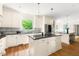 Bright kitchen features an island and stainless steel appliances at 4215 Cobscook Dr, Durham, NC 27707