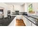 Light and bright kitchen with stainless steel appliances and granite countertops at 4215 Cobscook Dr, Durham, NC 27707