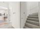 Staircase and hallway entrance view of modern kitchen and dinette at 4215 Cobscook Dr, Durham, NC 27707