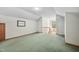 Spacious finished attic with carpet, a window, and storage space at 4405 New Brighton Dr, Apex, NC 27539