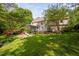 Beautiful backyard with a patio, a pool, and a screened-in porch at 4405 New Brighton Dr, Apex, NC 27539