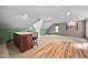 Spacious bonus room with island, unique architectural details, and ample space for various activities at 4405 New Brighton Dr, Apex, NC 27539