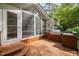 Outdoor deck with a grill, counter and storage cabinets at 4405 New Brighton Dr, Apex, NC 27539