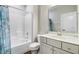 Bathroom with a tub and shower combination, with white vanity at 494 Mulberry Banks Dr, Clayton, NC 27527
