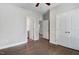Bedroom with ensuite bathroom and closet featuring hardwood floors at 494 Mulberry Banks Dr, Clayton, NC 27527