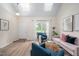 Welcoming living room featuring vaulted ceilings, natural light, stylish furniture, and cozy decor at 53 Forest Oaks Dr, Durham, NC 27705