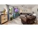 Bright and inviting living room features a large sectional sofa and modern decor at 5505 Knollwood Rd, Raleigh, NC 27609