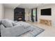 The basement living room features a cozy fireplace, plush seating, and a warm, inviting atmosphere at 5505 Knollwood Rd, Raleigh, NC 27609
