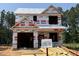 New construction home featuring durable exterior materials for lasting quality and energy efficiency in a desirable location at 57 Goldenrod Loop, Clayton, NC 27520