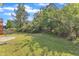 Well-manicured lawn and playground in the backyard at 615 Prides Crsg Xing, Rolesville, NC 27571