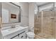 Modern bathroom with a glass-enclosed shower, white vanity, and contemporary fixtures for a spa-like feel at 615 Prides Crsg Xing, Rolesville, NC 27571