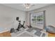 Versatile bedroom currently set up as a home gym, featuring hardwood floors and ample natural light at 615 Prides Crsg Xing, Rolesville, NC 27571