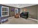 Bedroom featuring carpeted floors, windows, and decorated with artwork at 615 Prides Crsg Xing, Rolesville, NC 27571