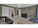 Bedroom featuring carpeted floors, windows, and decorated with artwork at 615 Prides Crsg Xing, Rolesville, NC 27571