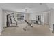 Neutral bonus room with carpet flooring, ceiling fan, and work-out equipment at 615 Prides Crsg Xing, Rolesville, NC 27571