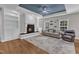 Inviting living room with fireplace, built-ins, and plenty of natural light from the large windows at 615 Prides Crsg Xing, Rolesville, NC 27571