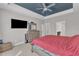 Comfortable bedroom with neutral carpet, and a view into the main bathroom at 615 Prides Crsg Xing, Rolesville, NC 27571