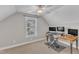 A bright home office with an ergonomic chair and dual monitors provides a comfortable workspace at 615 Prides Crsg Xing, Rolesville, NC 27571