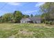 Spacious backyard with lush green grass and black fence, perfect for outdoor activities at 629 Houndsditch Cir, Wake Forest, NC 27587