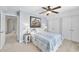 Comfortable bedroom featuring a queen bed, side tables and stylish decor at 629 Houndsditch Cir, Wake Forest, NC 27587
