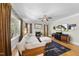 Comfortable living room featuring a fireplace, large windows, and modern decor at 629 Houndsditch Cir, Wake Forest, NC 27587