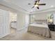 Serene main bedroom with ensuite bathroom and abundant natural light at 629 Houndsditch Cir, Wake Forest, NC 27587
