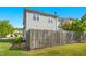 Fenced backyard featuring a home's exterior and landscaping at 6539 Clarksdale Ln, Durham, NC 27713