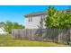 Fenced backyard featuring a home's exterior and landscaping at 6539 Clarksdale Ln, Durham, NC 27713