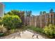 Backyard area featuring a concrete patio and greenery at 6539 Clarksdale Ln, Durham, NC 27713