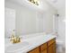 Bathroom featuring a vanity with a sink, light fixture, mirror, and shower at 6539 Clarksdale Ln, Durham, NC 27713