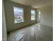 Unfinished bedroom featuring two windows that let in plenty of natural light at 788 Old Station Pointe, Angier, NC 27501