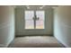 Dining room with a modern chandelier and trim work in the ceiling at 788 Old Station Pointe, Angier, NC 27501