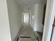 Bright hallway showcasing clean lines and neutral tones, creating an open and inviting atmosphere at 788 Old Station Pointe, Angier, NC 27501