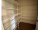 Walk-in pantry with wire shelving for organized storage at 788 Old Station Pointe, Angier, NC 27501