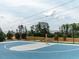 Community basketball court with modern hoop and flooring, providing a place for recreation at 83 Vandalia Ave, Chapel Hill, NC 27516