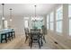 Dining room area featuring dining table set and views to kitchen at 83 Vandalia Ave, Chapel Hill, NC 27516