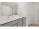 Bathroom featuring double sink vanity with gray cabinetry and a large framed mirror at 908 Kensley Grove Ln # 68, Fuquay Varina, NC 27526