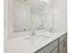 Bathroom featuring double sink vanity with sleek fixtures and a glass-enclosed shower at 908 Kensley Grove Ln # 68, Fuquay Varina, NC 27526