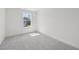 Well-lit bedroom featuring soft carpet and a window offering natural light at 908 Kensley Grove Ln # 68, Fuquay Varina, NC 27526