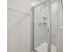 Modern tiled shower with glass door, providing a sleek and updated bathroom experience at 908 Kensley Grove Ln # 68, Fuquay Varina, NC 27526