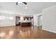 Open concept living space with a kitchen, hardwood floors, and lots of natural light at 10 Currituck Ln, Durham, NC 27703