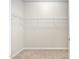 Walk-in closet with shelving for ample storage space at 10 Currituck Ln, Durham, NC 27703