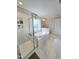 Bathroom featuring a soaking tub, glass-enclosed shower, and bright natural light at 1002 Dogwood Bloom Ln, Knightdale, NC 27545